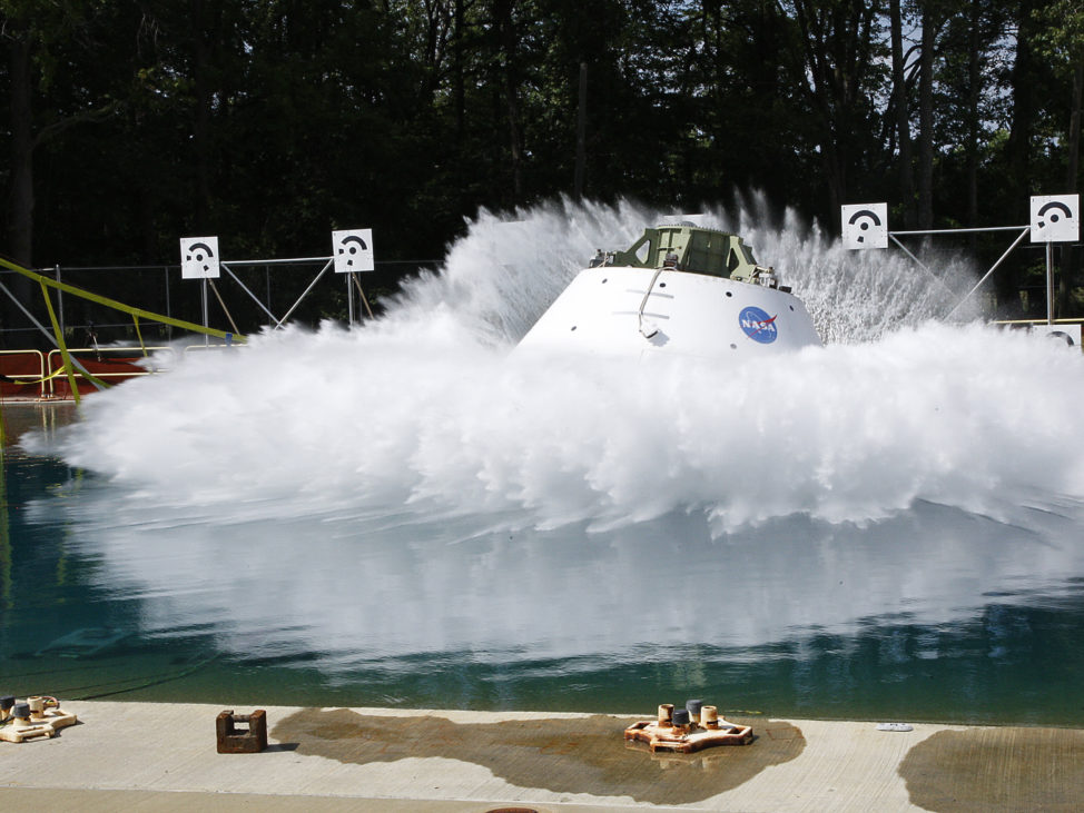 A mockup of NASA's Orion spacecraft hits the water in a simulated ocean splashdown test at NASA Langley Research Center in Hampton, VA on 8/25/16. The spacecraft is designed for deep space travel and will someday ferry astronauts to Mars. An unmanned test flight is scheduled for 2018 with the first crewed flight is slated for 2023. (NASA)