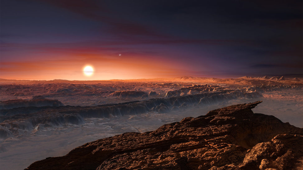 Artist’s impression of the surface of the exoplanet Proxima Centauri b orbiting the red dwarf star Proxima Centauri, the closest star to our solar system. You can also see the better known double star Alpha Centauri AB in the image. Astronomers at the European Southern Observatory announced the discovery of the exoplanet, which is only 4.2 light years away from Earth on 8/24/16. The planet orbits its star within the habitable zone, where the temperature is said to be suitable for liquid water to exist on its surface. (ESO/M. Kornmesser)