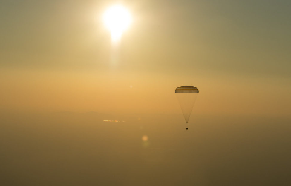 A Soyuz TMA-20M spacecraft with returning ISS Expedition 48 crew members Jeff Williams a NASA astronaut and cosmonauts Alexey Ovchinin, and Oleg Skripochka of the Russian space agency Roscosmos is about to land near the town of Zhezkazgan, Kazakhstan on 9/7/16. (NASA)