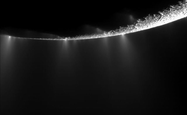 Narrow jets of gas and icy particles erupt from the south polar region of Enceladus, contributing to the moon's giant plume. (NASA/JPL/Space Science Institute)