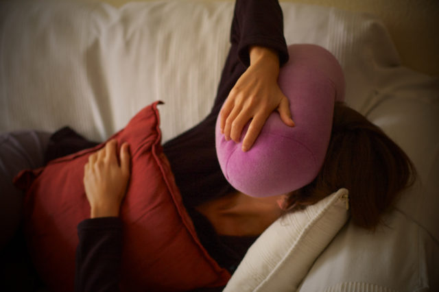 Woman suffers from headache (Gonzalo Malpartida via Flickr/Creative Commons)