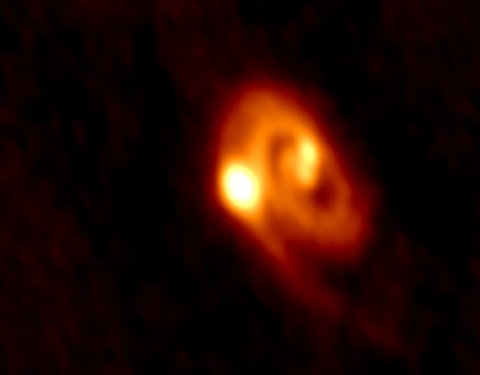 On 10/26/16, scientists announced the discovery of the L1448 IRS3B system, which is a rare triple-star system located some 750 light-years from Earth. The scientists, who made their discovery with the Atacama Large Milimeter/submillimeter Array or ALMA, in Chile say their discovery supports evidence of disk fragmentation—a process that leads to the formation of young binary and multiple star systems. (University of Oklahoma and ALMA)