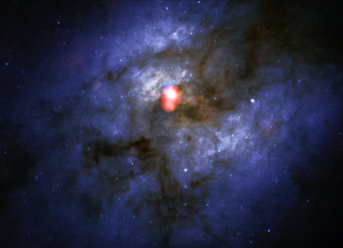 The compound view shows a new ALMA Band 5 view of the colliding galaxy system Arp 220 - in red - on top of an image from the NASA/ESA Hubble Space Telescope -blue/green - (ESO/NAOJ/NRAO/NASA/ESA/STScI/AURA)