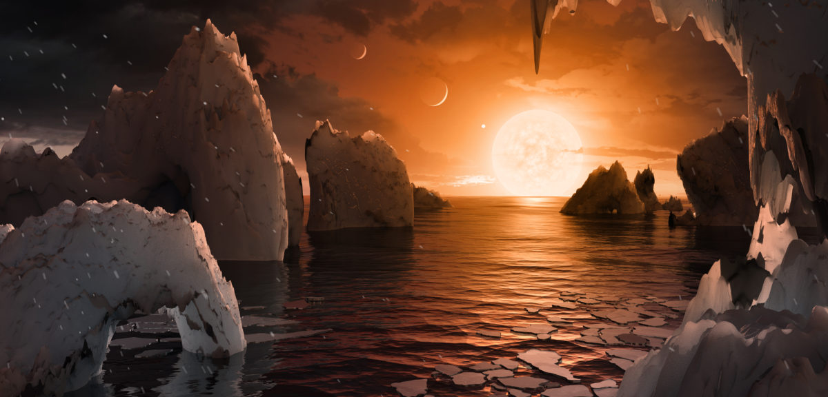 This illustration shows the possible surface of TRAPPIST-1f, one of the newly discovered planets in the TRAPPIST-1 system. (NASA/JPL-Caltech)