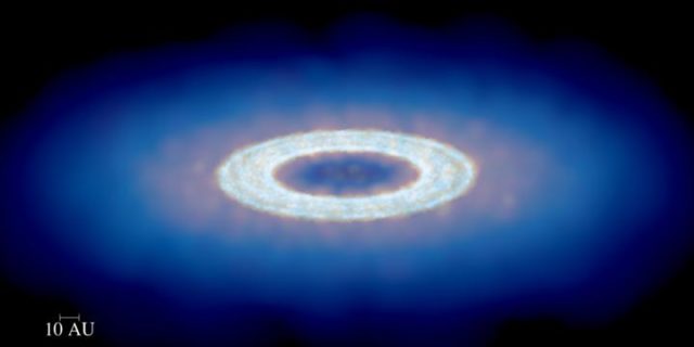 An image of a protoplanetary disk, made using results from the new model, after the formation of a spontaneous dust trap, visible as a bright dust ring. Gas is depicted in blue and dust in red. (Jean-Francois Gonzalez)