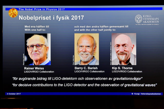 The names of Rainer Weiss, Barry C. Barish and Kip S. Thorne are displayed on the screen during the announcement of the winners of the Nobel Prize in Physics 2017, in Stockholm, Sweden, October 3, 2017. (TT News Agency/Jessica Gow via REUTERS)