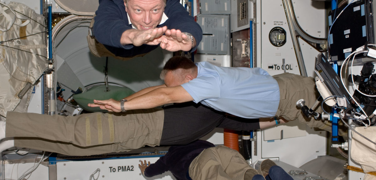 Four members of the joint STS-135/Expedition 28 crews are able to spend part of their last shared time onboard the International Space Station performing floating exercises that can't be done in Earth's gravity. Inside the Harmony Node 2 module, are NASA astronauts Mike Fossum (top), Expedition 28 flight engineer, and Doug Hurley, STS-135 pilot; and Ron Garan, Expedition 28 flight engineer. The crew member at bottom is partially obscured and is unidentified. (NASA)