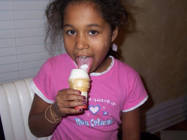 A child enjoying the taste of ice cream (Smoooochie/Creative Commons Attribution-ShareAlike 2.0 Generic via Flickr)