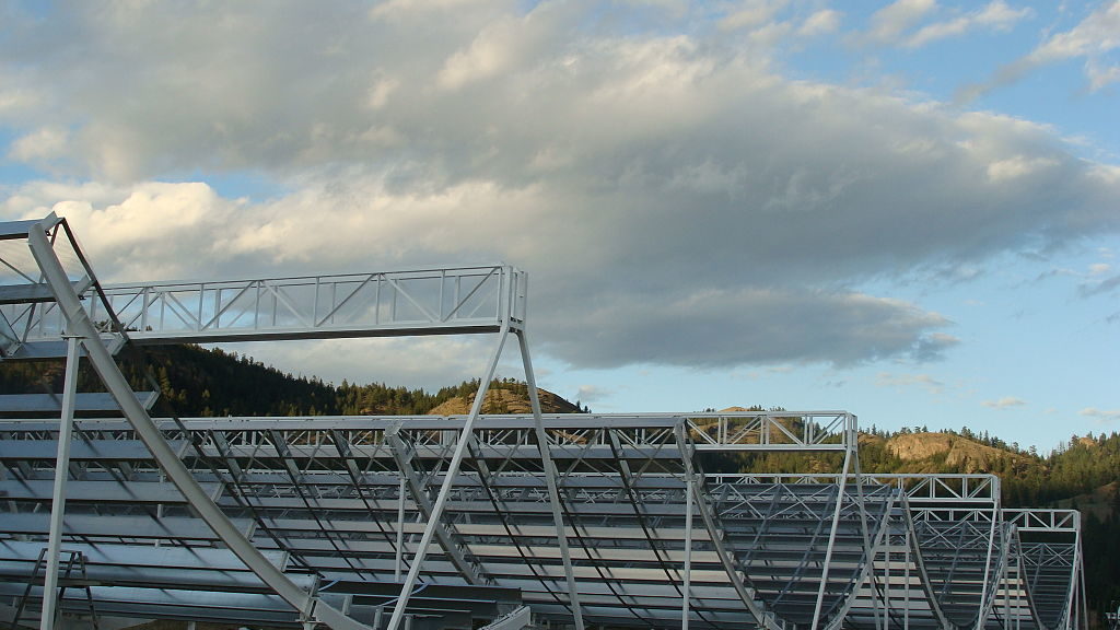 The Canadian Hydrogen Intensity Mapping Experiment, (CHIME) in 2015, during construction of the parabolic trough reflector at the Dominion Radio Astrophysical Observatory in British Columbia, Canada. (Mateus A. Fandiño/Creative Commons BY-SA 4.0 via Wikimedia Commons)