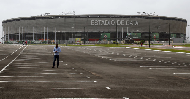 A man walks in front of the Estadio de Bata in Bata (Reuters)