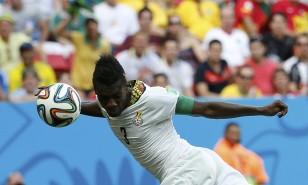 Ghana's Gyan heads to score against Portugal during their 2014 World Cup Group G soccer match at the Brasilia national stadium in Brasilia