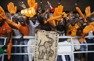 Ivory Coast's fans celebrate after winning their semi-final soccer match of the 2015 African Cup of Nations against Democratic Republic of Congo in Bata