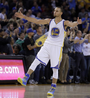 Stephen Curry celebrates another basket. Photo: AP