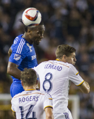 Didier Drogba in action against British star Steven Gerrard of the Los Angeles Galaxy, another international player in his first MLS season. Photo: Ringo H.W. Chiu / AP