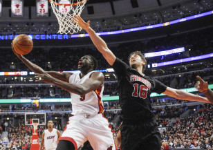 Miami's Luol Deng puts up a shot during a game against the Chicago Bulls, his former club. Photo: David Banks-USA TODAY Sports