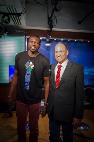 Luol Deng and Sonny in the Voice of America's Studio 53.