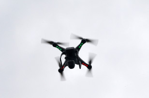 A camera drone flown by Brian Wilson flies near the scene where two buildings were destroyed in an explosion, in the East Harlem section in New York City, March 12, 2014. (Reuters)
