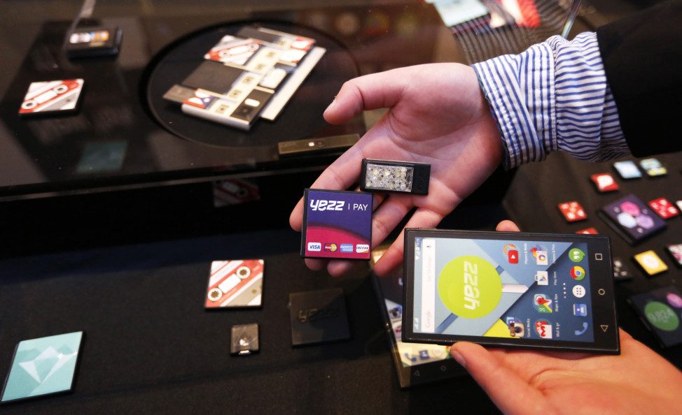 FILE - Prototype modular parts created by Yezz Mobile for Project Ara, Google's modular smartphone project, are shown during the Mobile World Congress in Barcelona, Spain, March 1, 2015. Google's Project Ara is a development effort to create a modular smartphone ecosystem. (Reuters)