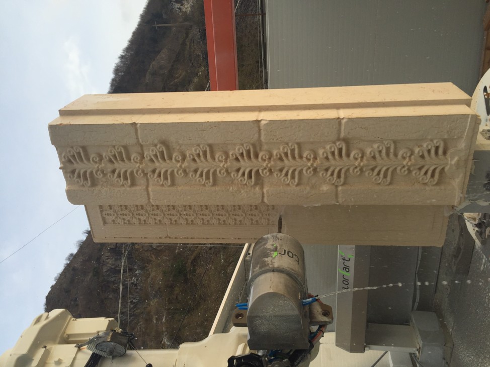 A machine recreates a section of Palmyra's 2000-year-old Triumphal Arch as part of an venture to display the completed replica of the structure in multiple locations around the world on April 19 to mark World Heritage Day 2016. (AP)