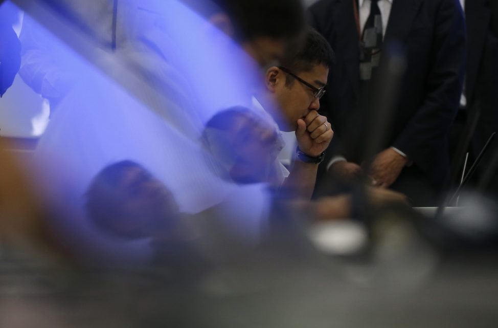 FILE - Participants from government ministries and agencies take part in the Cyber Defense Exercise with Recurrence (CYDER) in Tokyo September 25, 2013. (Reuters)