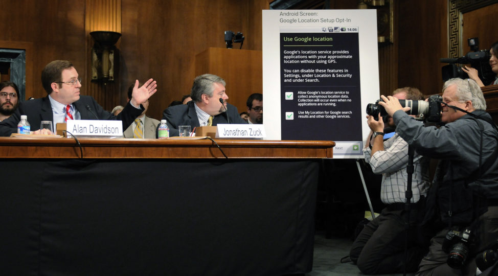 FILE - Google Director of Public Policy Alan Davidson (L) refers to a chart showing how users must opt-in to share location data at a Senate Judiciary Committee hearing titled 'Protecting Mobile Privacy: Your Smartphones, Tablets, Cell Phones and Your Privacy' on Capitol Hill in Washington, May 10, 2011. (Reuters)