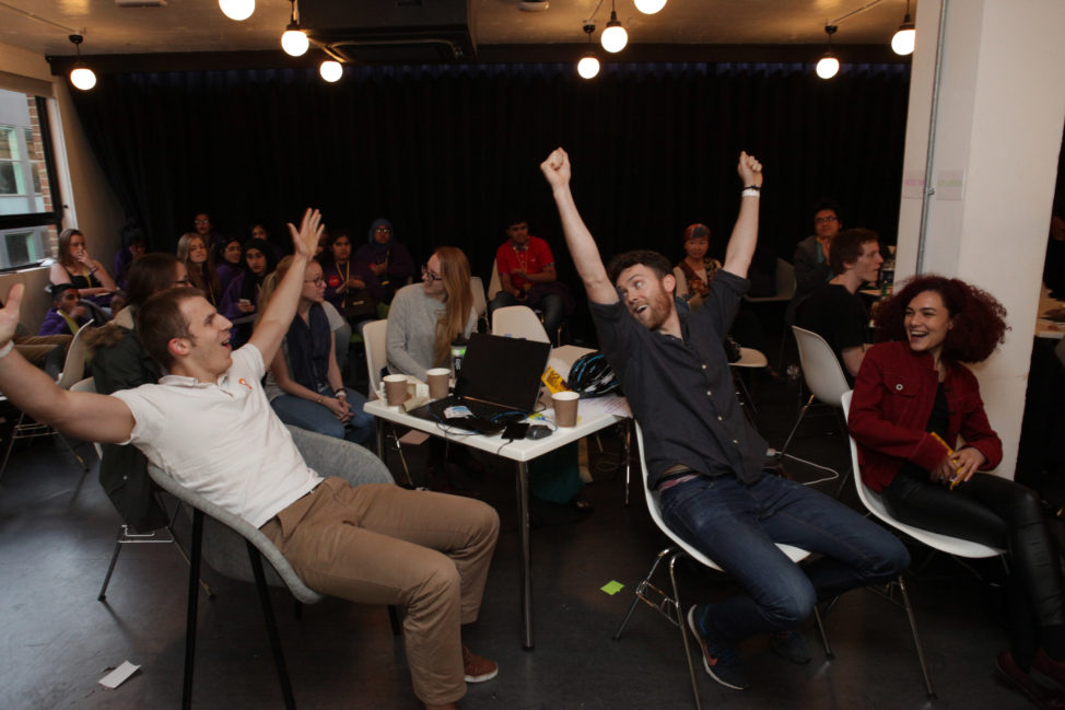 The winning team at Peacehack 2016 celebrate after their plugin, ;'Hate Speech Blocker' was announced the winner, in London, England. (International Alert)