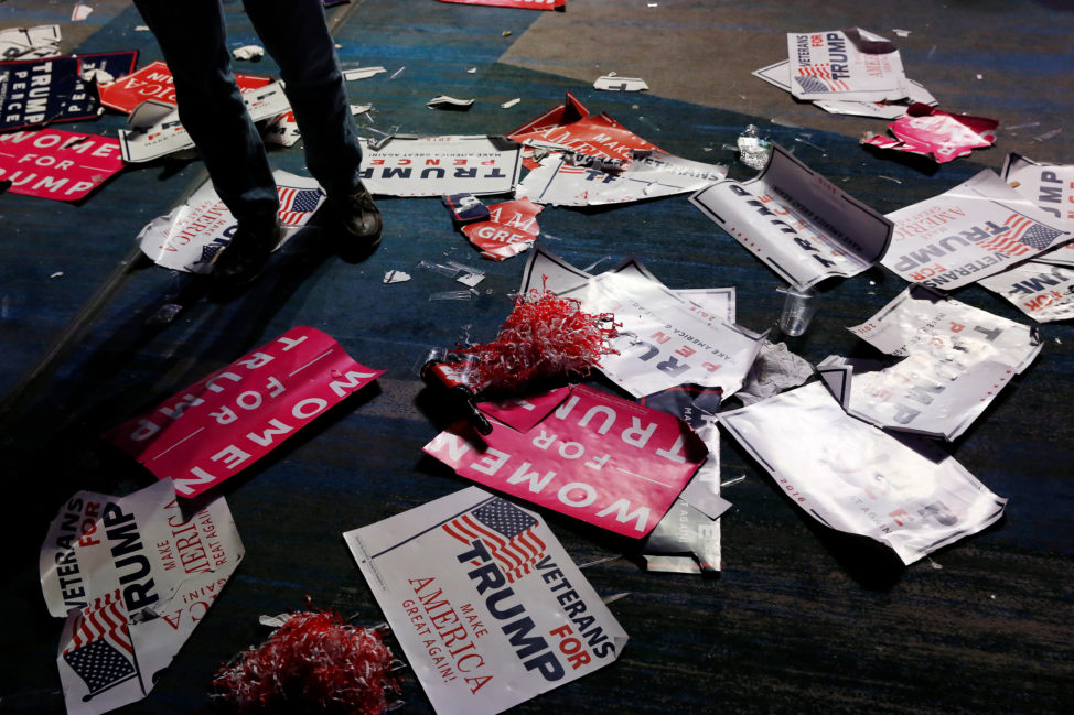 Debris and signs are left on the floor after the victory party for Republican president-elect Donald Trump, New York, New York, US Nov. 9, 2016. (Reuters) 
