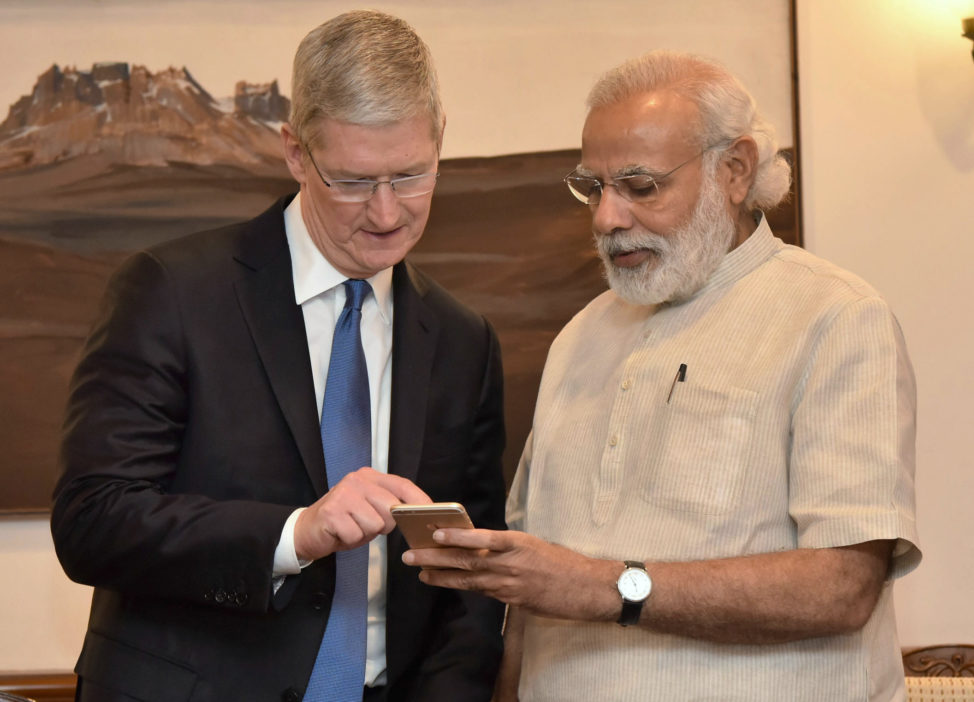 FILE - A hoto released by the Press Information Bureau of India, Indian Prime Minister Narendra Modi (R) as he meets with Apple CEO Tim Cook, in New Delhi, India, Saturday, May 21, 2016. (AP)