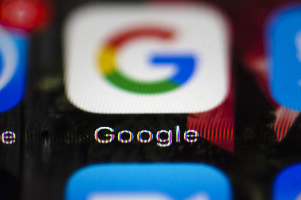 A Google icon is shown on a mobile phone in Philadelphia, April 26, 2017. (AP)