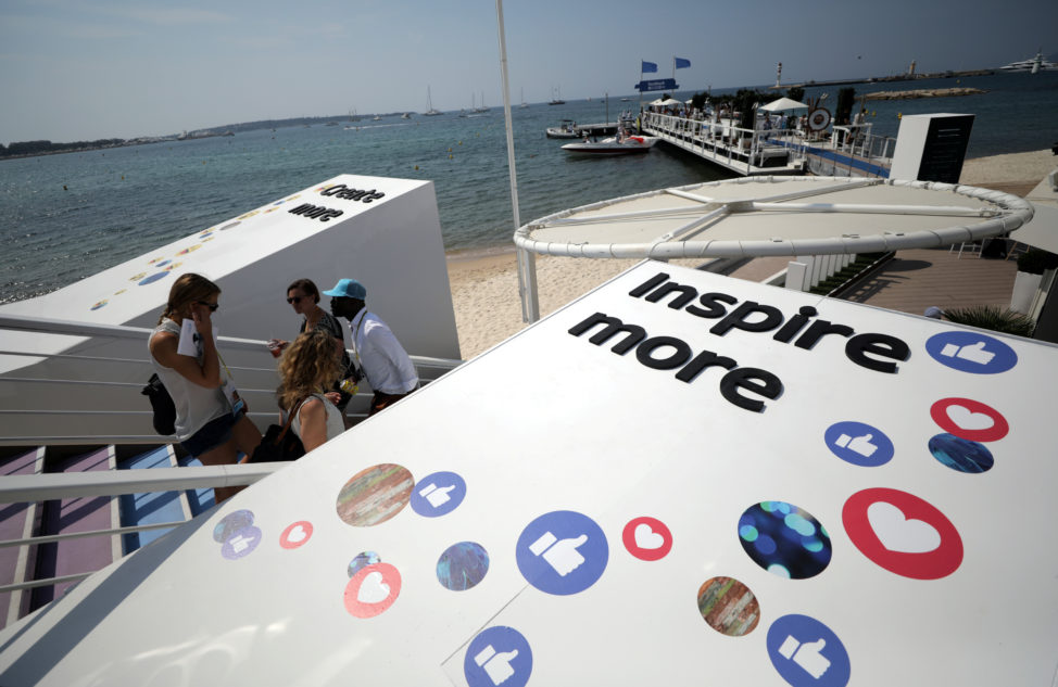 Logos of the social network Facebook are seen on a beach during the Cannes Lions in Cannes, France, June 21, 2017. (Reuters) 