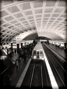 The crowd on the left is about to board a Washington subway.  Poor souls.  Some of them are actually hoping they’ll find seats unoccupied by people, purses, and other riders’ feet.  (laffy4k, Flickr Creative Commons)