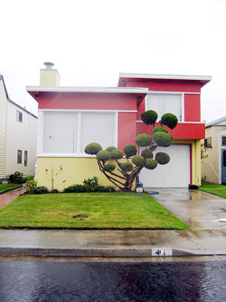 This is a house in Daly City, California, which one observer called a “surreal suburb” of homes covering every hillside outside San Francisco. Nancy Reynolds has said that her mother, Malvina, got the idea for her “Little Boxes” song while driving through Daly City. (Telstar Logistics, Flickr Creative Commons)