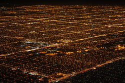 Do you want a handy image of suburban sprawl? These are just some of Chicago’s suburbs, photographed from an airplane that was departing O’Hare Airport at night. (San Diego Shooter, Flickr Creative Commons)