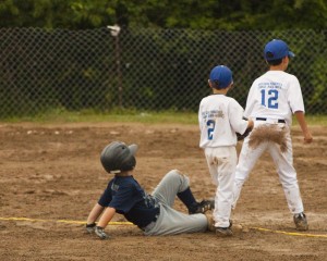 Somehow, “Little Freddie White slides into second as Billy Rawlings and Johnny Finklestein-Scarborough wait for a throw” trips off the tongue as a baseball-game description.  (frankpierson, Flickr Creative Commons)