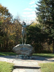 Joseph Pollia’s ‘Hail to the Sunrise’ statue in Claremont on the Mohawk Trail depicts a warrior looking to the east with arms lifted the Great Spirit. (Wikipedia Commons)