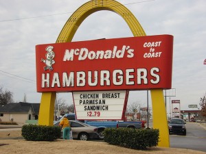 Thousands more McDonald’s locations have popped up since this one opened in 1983.  The chain’s “golden arches” are as common as county courthouses across America.  (pnoeric, Flickr Creative Commons)