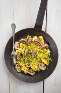 Another morning, another imaginative way to prepare scrambled eggs.  What’s that green stuff, do you think?