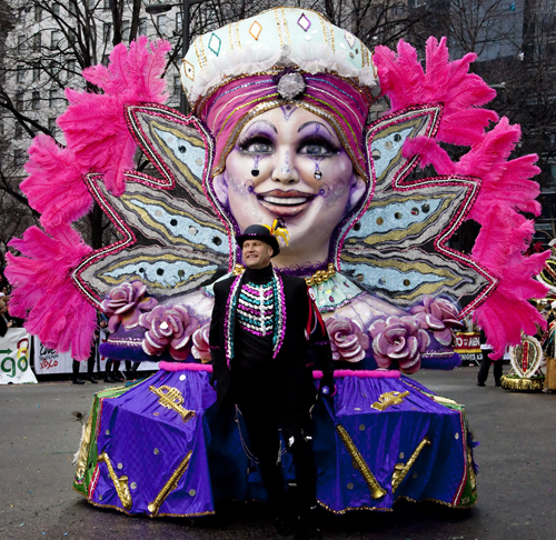 This Mummer lugged a very large friend along with him.  (Carol M. Highsmith)