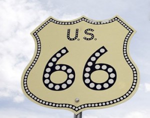 Distinctive U.S. Highway signs had the look of a police shield, and in places that could afford it, reflective insets.  (U.S. Highway Administration)