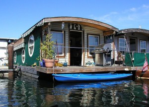 Rednecks sometimes live in "double-wide" trailers.  This looks like a double-wide HOUSEBOAT.  (Wacqu, Wikipedia Commons)