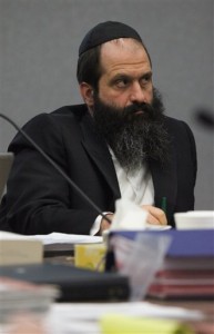 Ruboshkin listens to testimony in his fraud trial.  (AP Photo/Andrea Melendez)