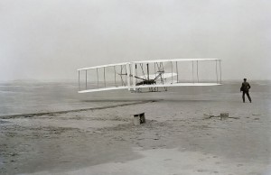 One of history's most significant photographs, of Orville in the air during the first flight, and Wilbur running behind.  (Library of Congress)