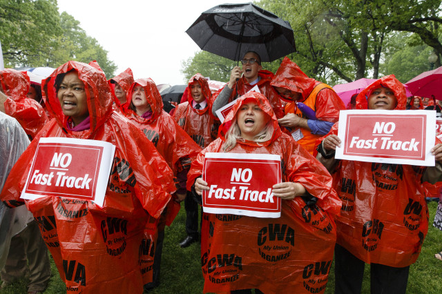 Demonstrators rally for fair trade at the Capitol in Washington,  May 7, 2014.. (AP/J. Scott Applewhite)
