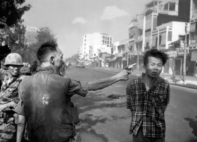 South Vietnamese Gen. Nguyen Ngoc Loan, chief of the national police executes suspected Viet Cong officer Nguyen Van Lem on a Saigon street Feb. 1, 1968. (AP Photo/Eddie Adams)