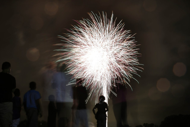 People watch a fireworks display in Newark, N.J. on June 30, 2015. (AP)