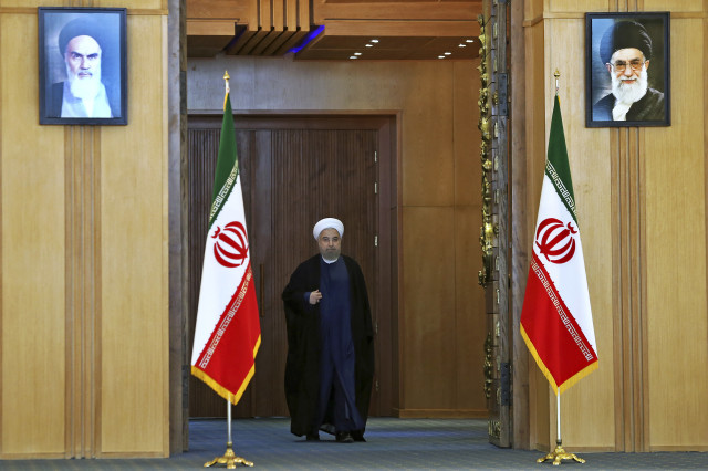 Iran's president Hassan Rouhani arrives for an address to the nation after a nuclear agreement was announced. Tehran, Iran, July 14, 2015 (AP)