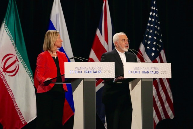 Federica Mogherini (left), EU High Representative for Foreign Affairs and Javad Zarif, Iranian Foreign Minister, address the media in Vienna on July 14 about the deal reached between the P5+1 and Iran to limit Iran's nuclear weapons program. (VOA) 