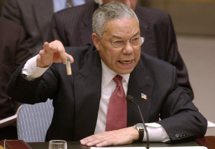 Secretary of State Colin Powell holds up a vial he said could contain anthrax as he presents evidence of Iraq's alleged weapons programs to the United Nations Security Council in this Feb. 5, 2003 file photo. (AP)