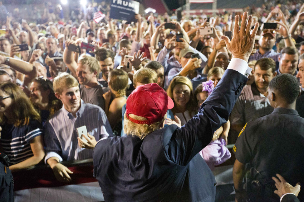 Republican presidential candidate Donald Trump waves to the crowd during a campaign rally on Aug. 21, 2015 in Mobile, Ala. (AP)