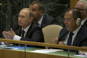 Russian President Vladimir Putin, left, and Foreign Minister Sergei Lavrov listen as Chinese President Xi Jinping addresses the 70th session of the United Nations General Assembly at U.N. headquarters on Sept. 28, 2015. (AP)